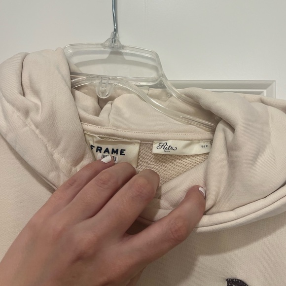 Frame X Ritz Paris Crest Unisex Hoodie Sweatshirt in Cream, Size Small - Picture 9 of 9